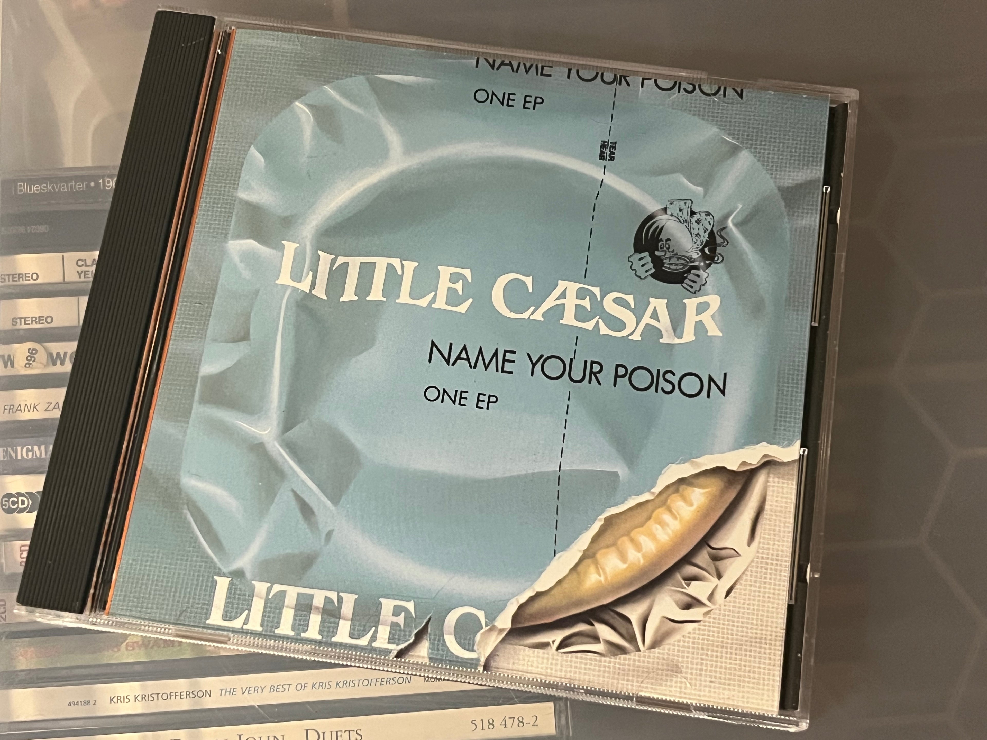 Little Caesar – Name Your Poison (NM/vg+) 4-spårs EP bakre inlay har litet punchhole över barcode