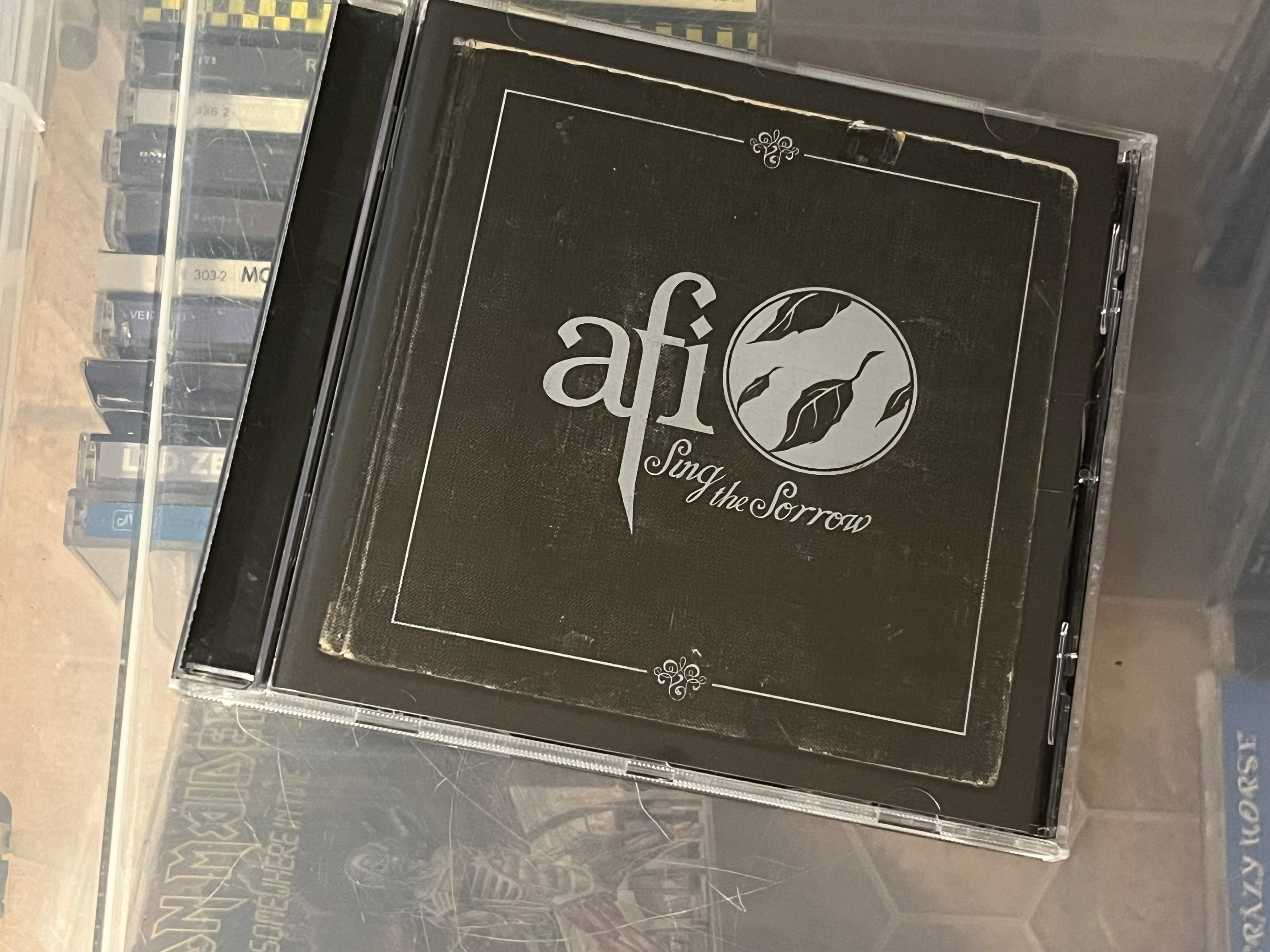 AFI – Sing The Sorrow (NM/NM) Silver art-version