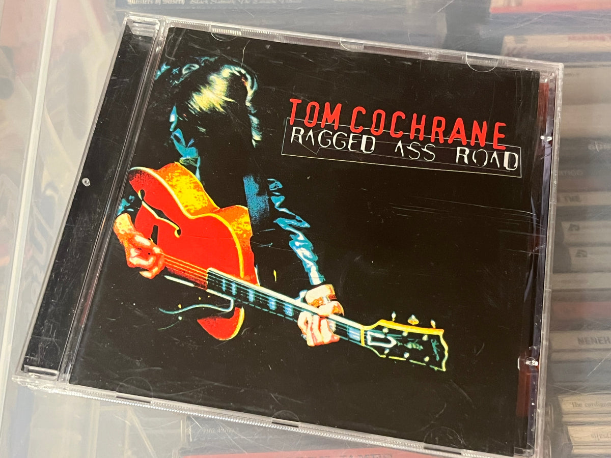 Tom Cochrane – Ragged Ass Road (NM/NM)