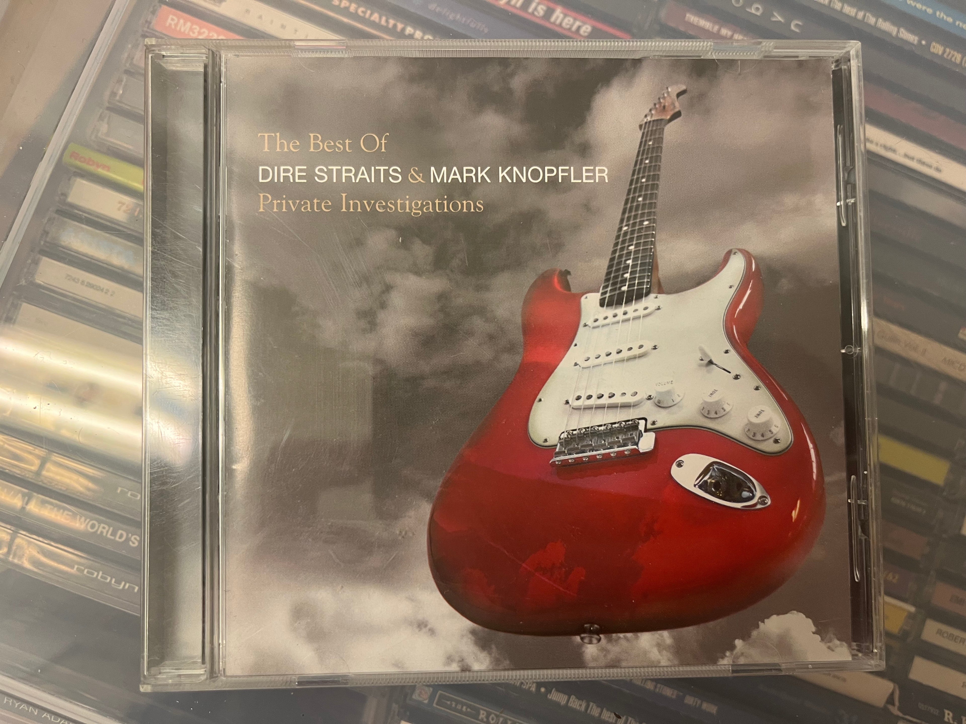 Dire Straits & Mark Knopfler - Private Investigations (NM/NM)