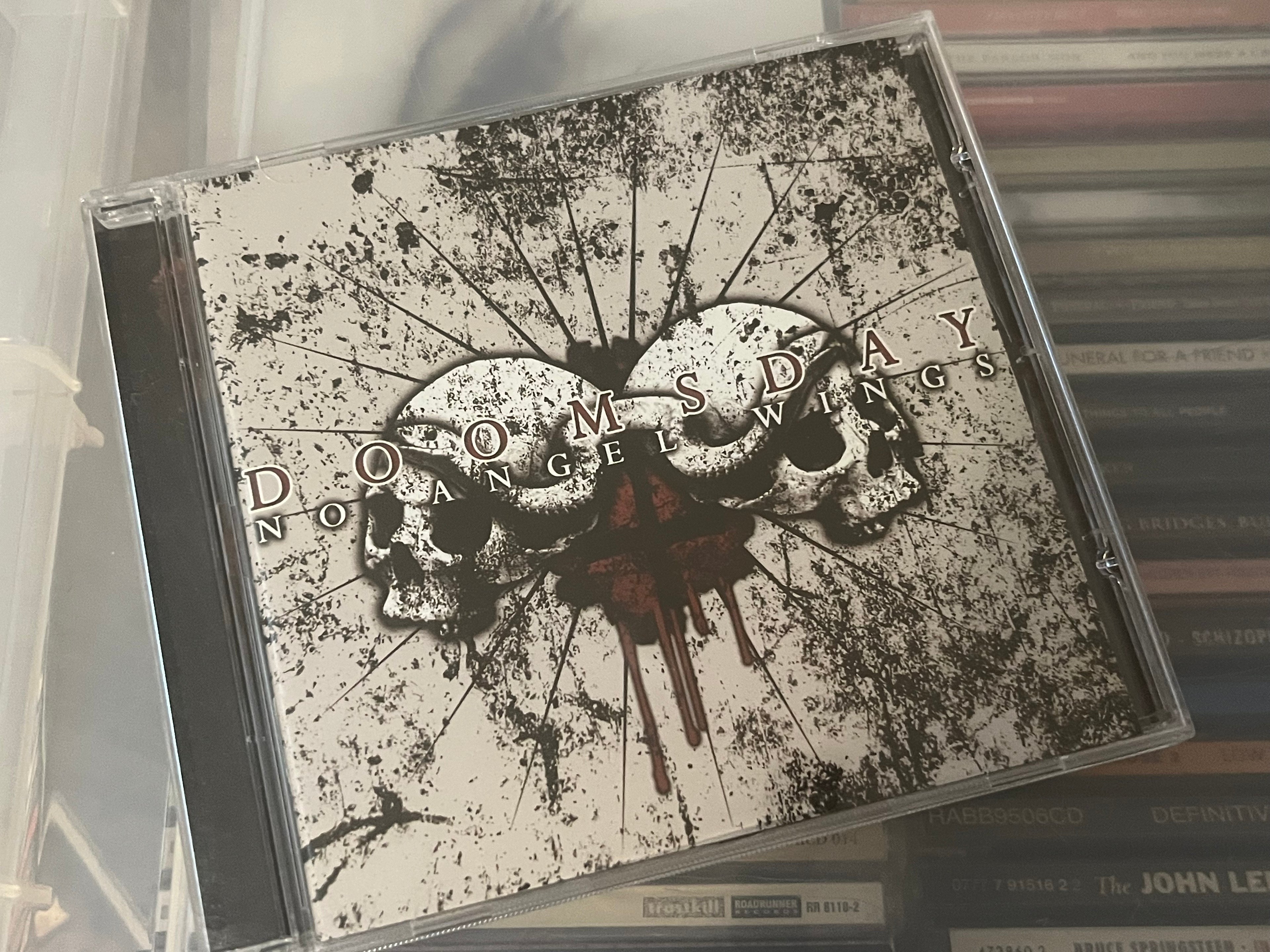 Doomsday – No Angel Wings (NM/NM)