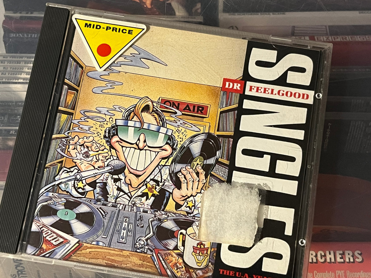 Dr. Feelgood – Singles (The U.A. Years+) (NM/NM) UK-89