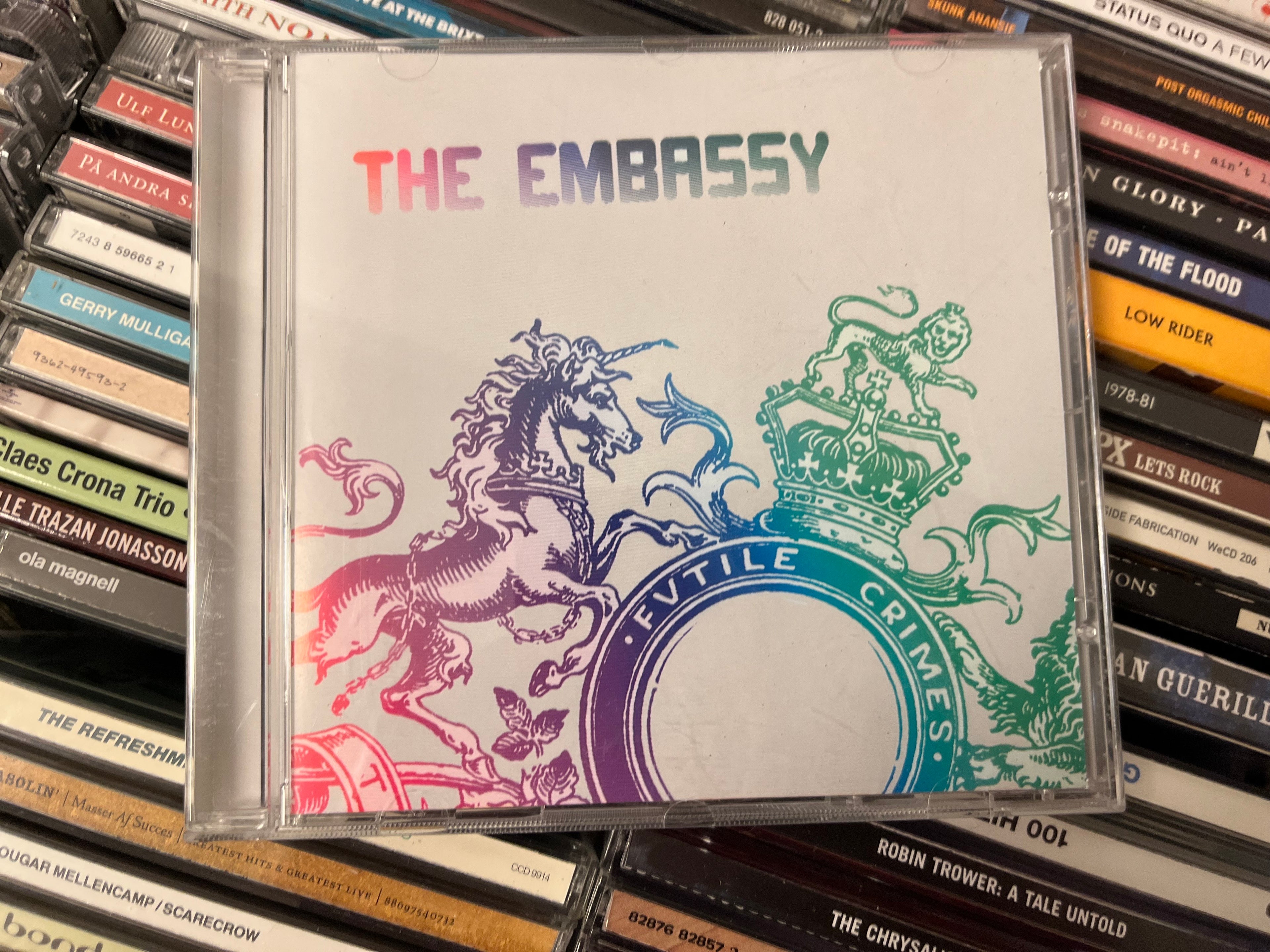 The Embassy – Futile Crimes (NM/NM)