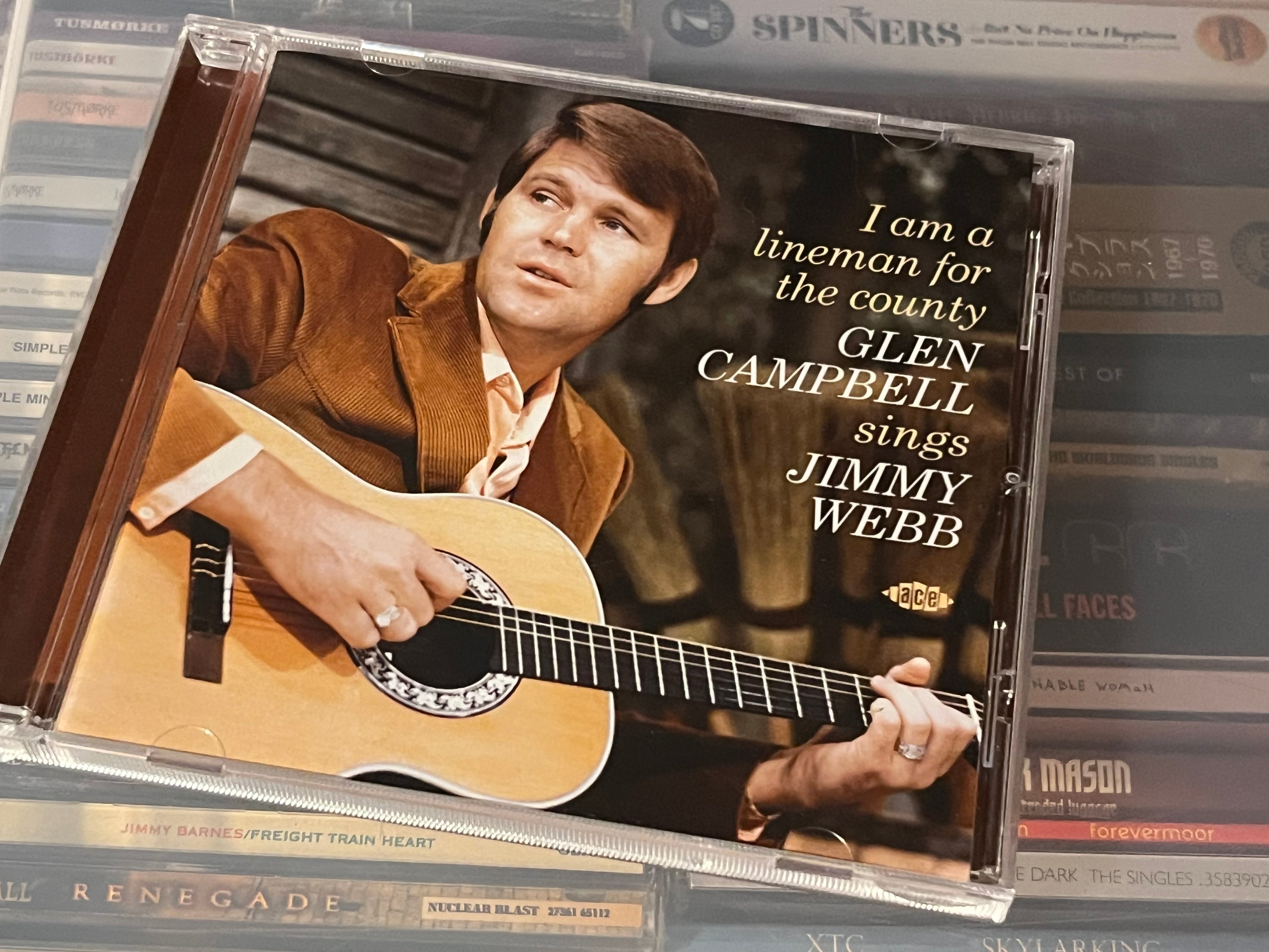 Glen Campbell ‎– I Am A Lineman For The County (Glen Campbell Sings Jimmy Webb) (NM/NM) UK-24 Smårar Campbell-comp