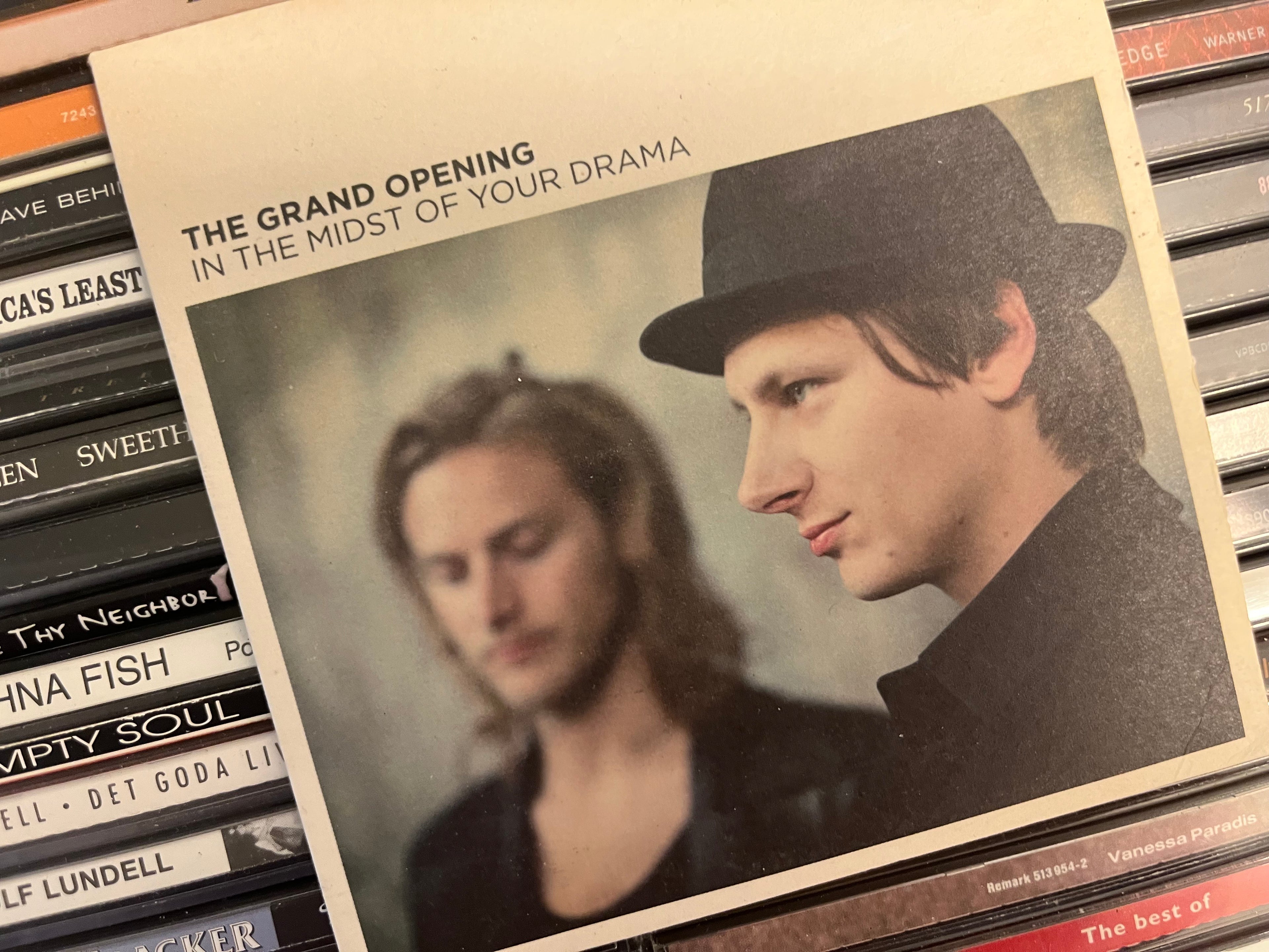 The Grand Opening – In The Midst Of Your Drama (NM/NM)