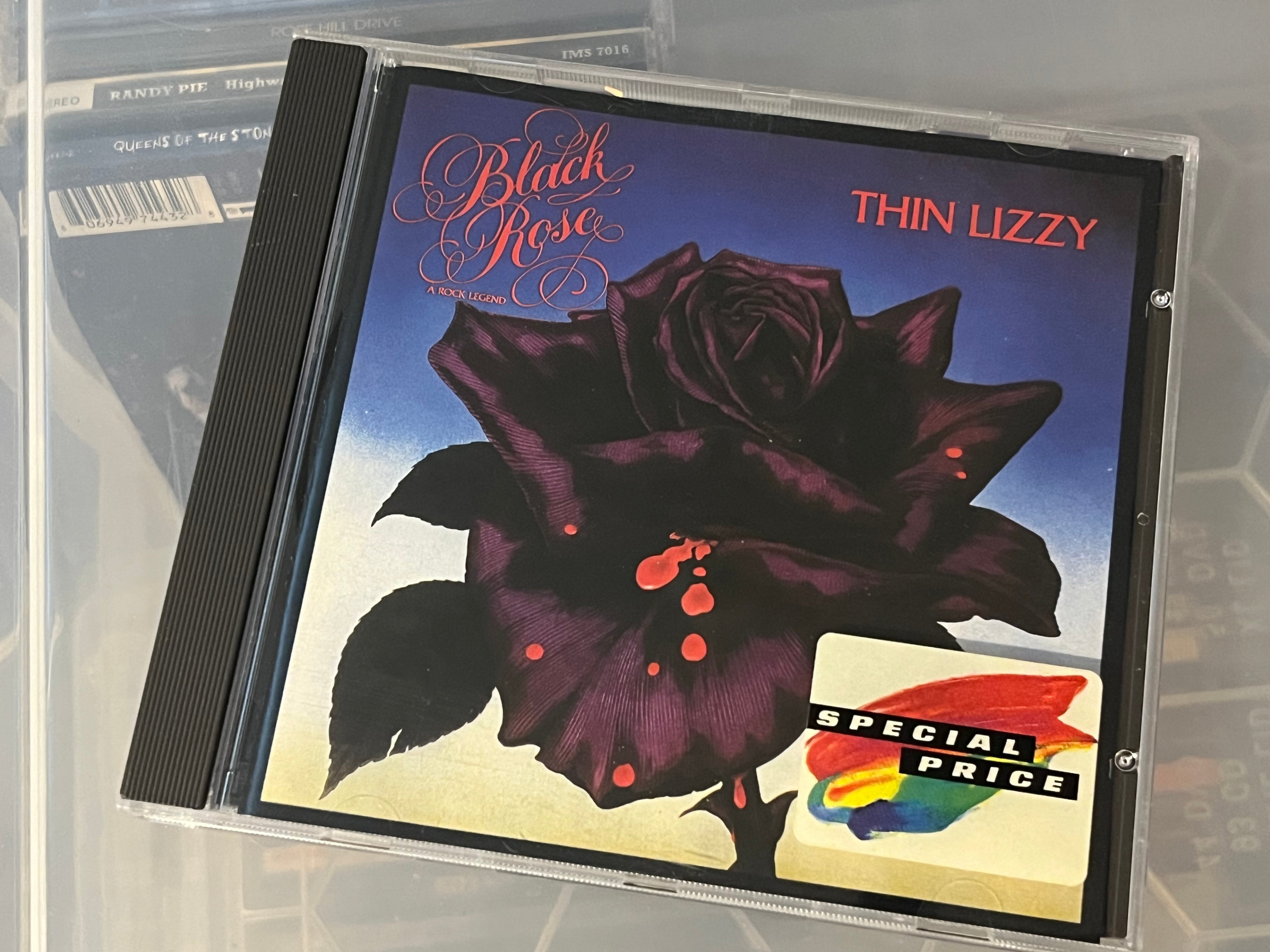 Thin Lizzy – Black Rose (A Rock Legend) (NM/NM) tidig EU red swirl