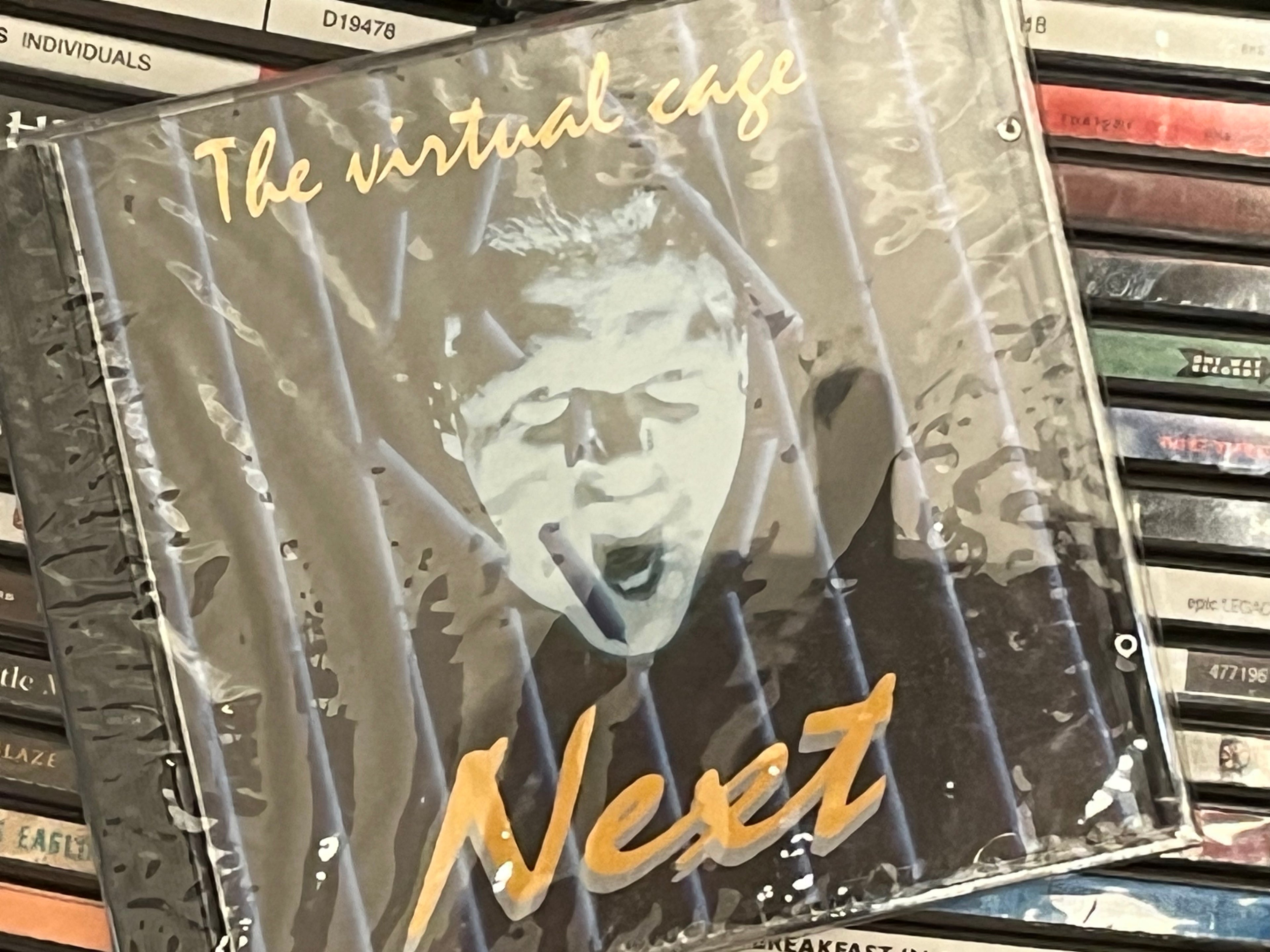 Next – The Virtual Cage (SEALED)