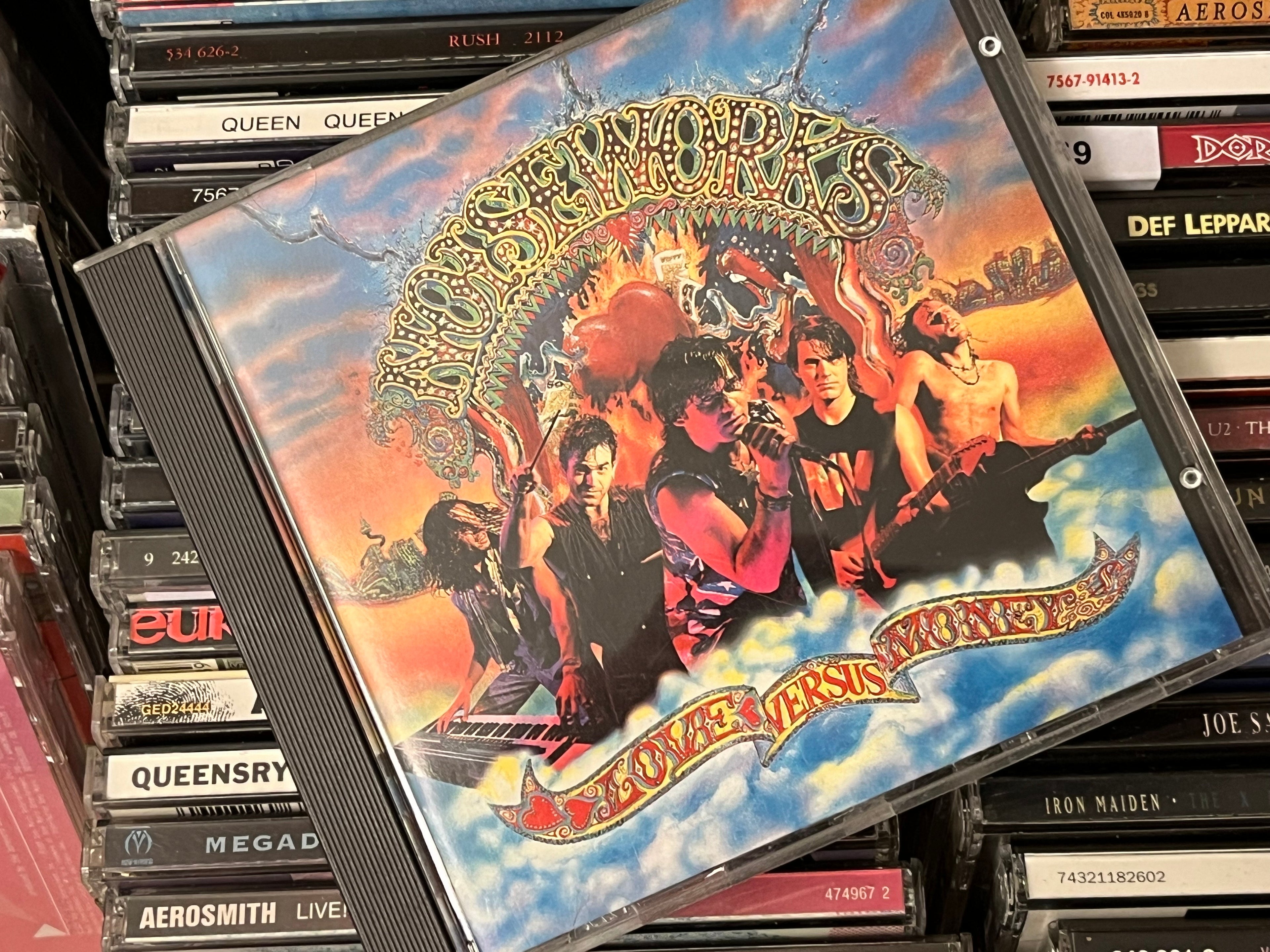 Noiseworks – Love Versus Money (NM/NM)