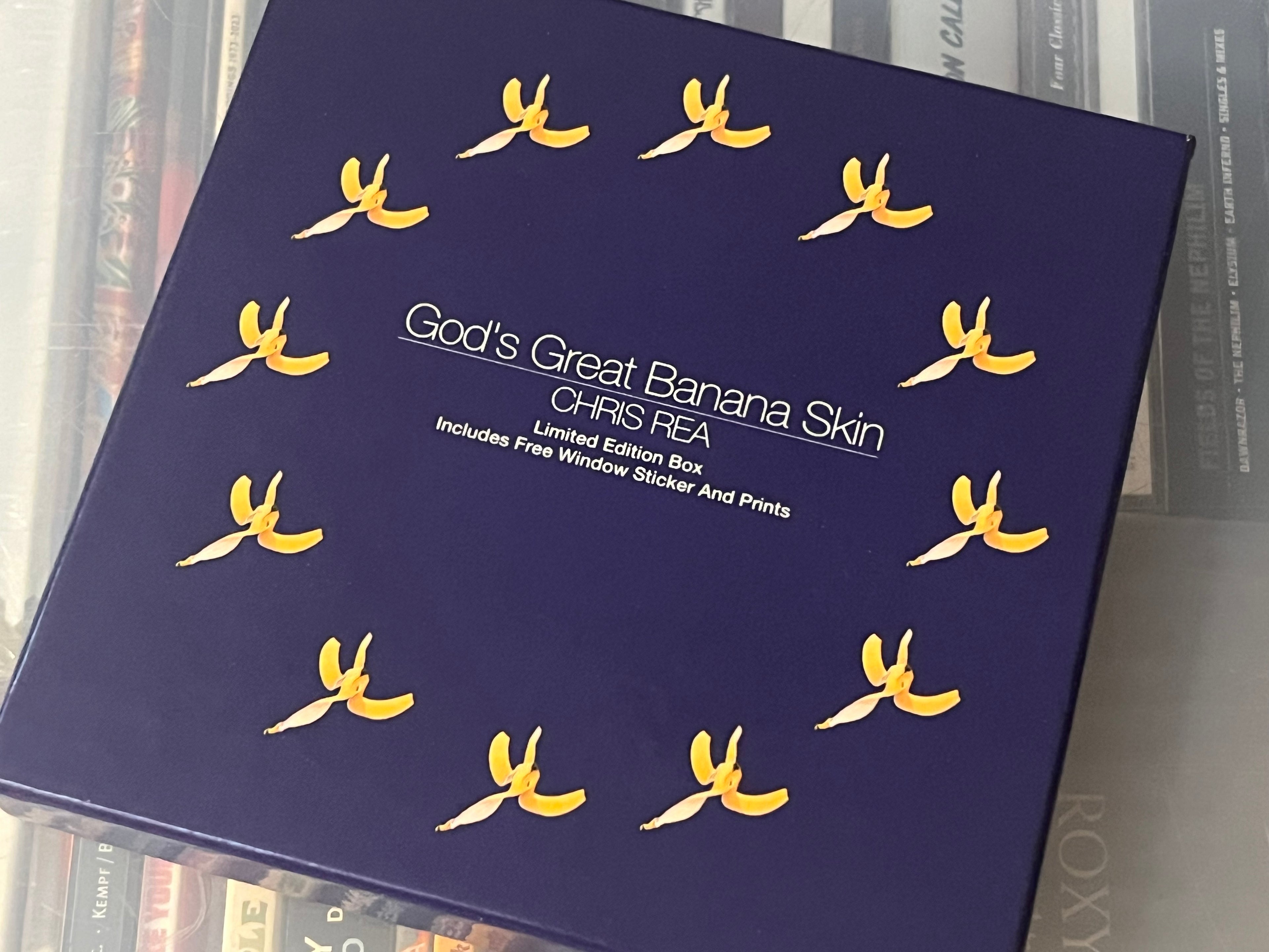 Chris Rea ‎– God's Great Banana Skin (NM/NM) 4-spårs single i Box med sticker och artprint.