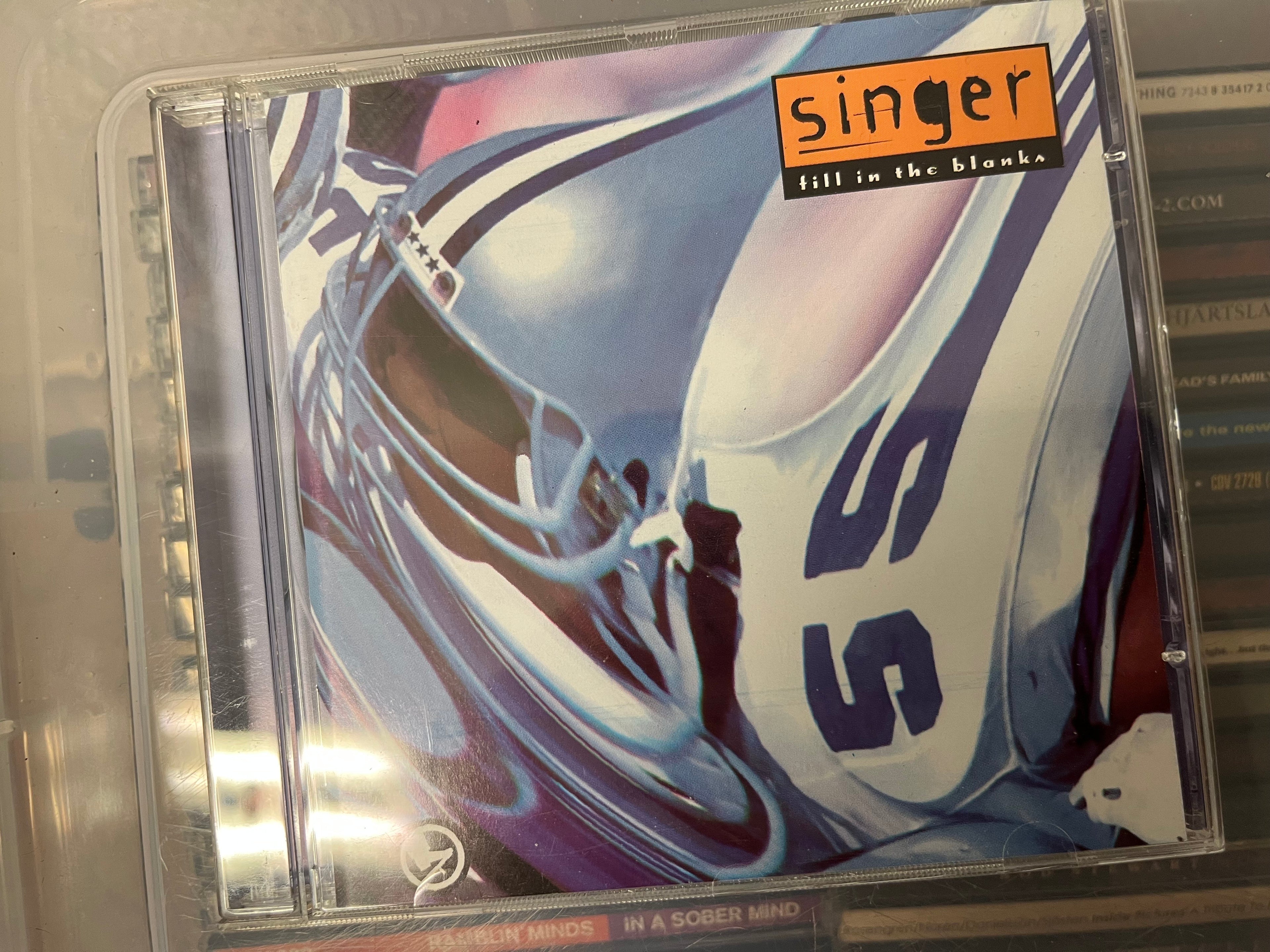 Singer – Fill In The Blanks (NM/NM)