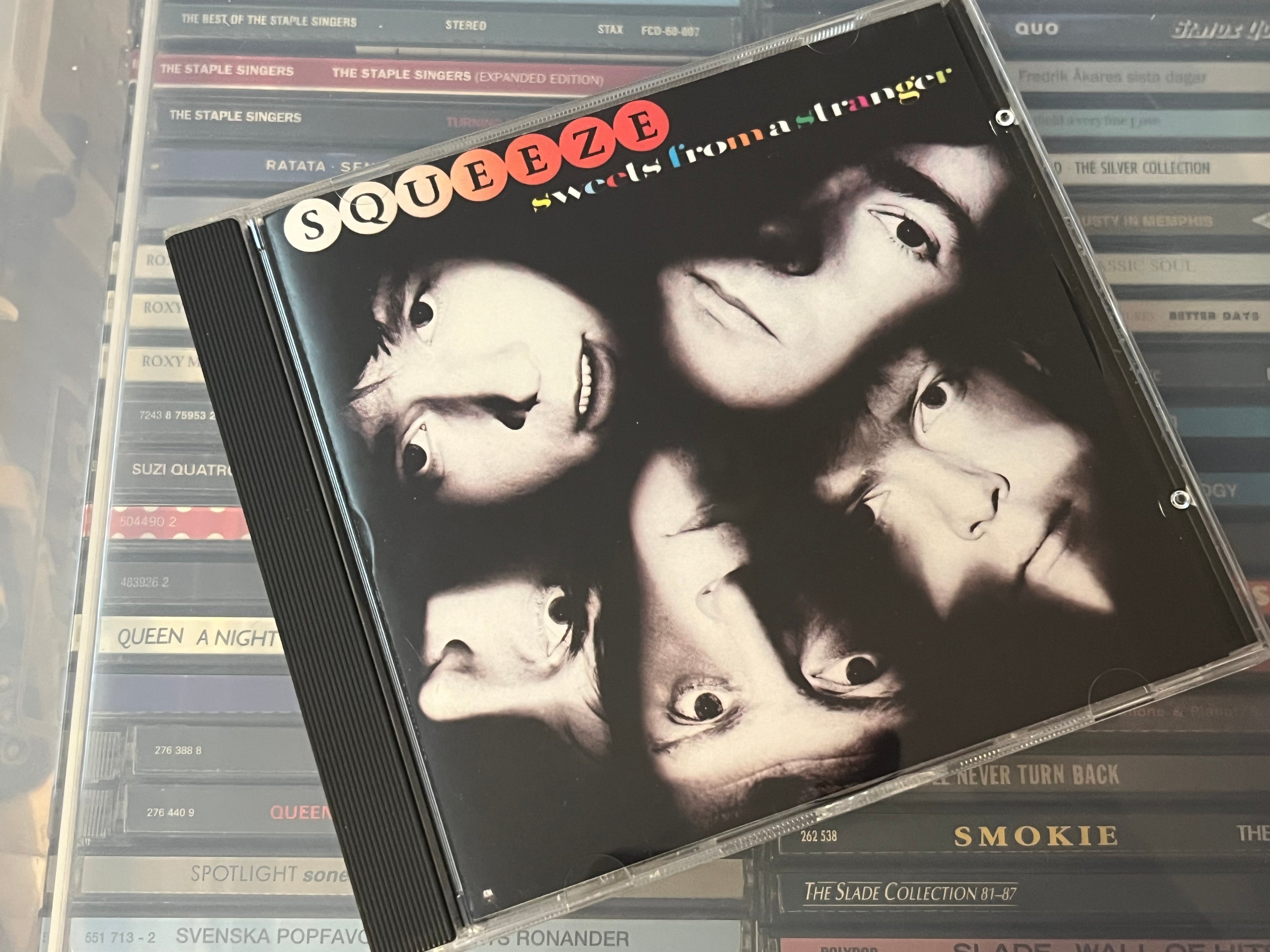 Squeeze – Sweets From A Stranger (NM/NM) Remaster