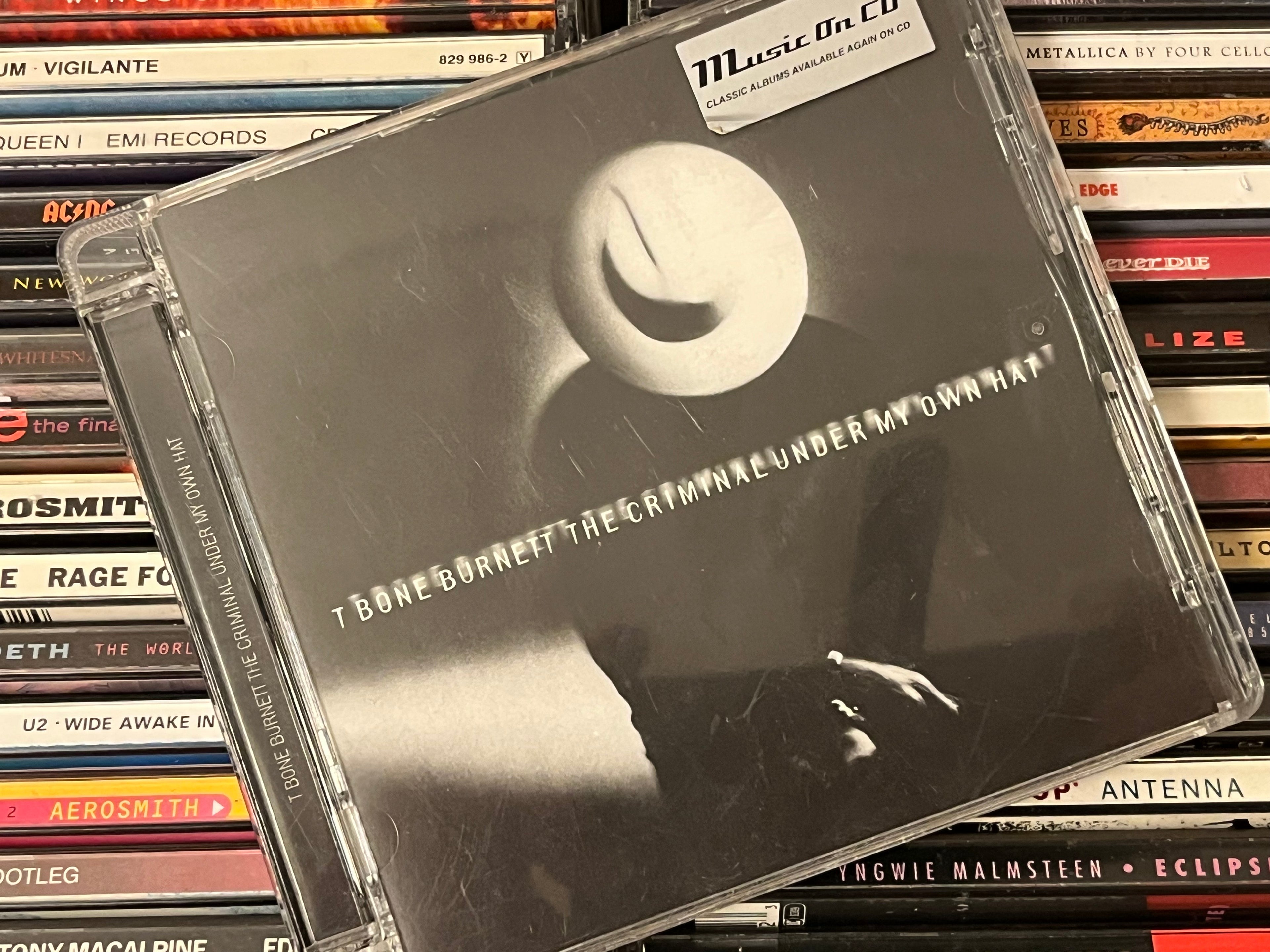 T Bone Burnett – The Criminal Under My Own Hat (NM/NM) super jwl case-version