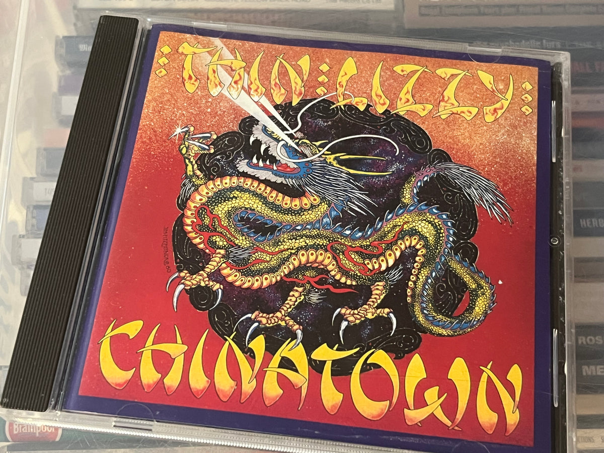 Thin Lizzy - Chinatown (vg+/vg) red swirl - fula märken, men spelar bra!