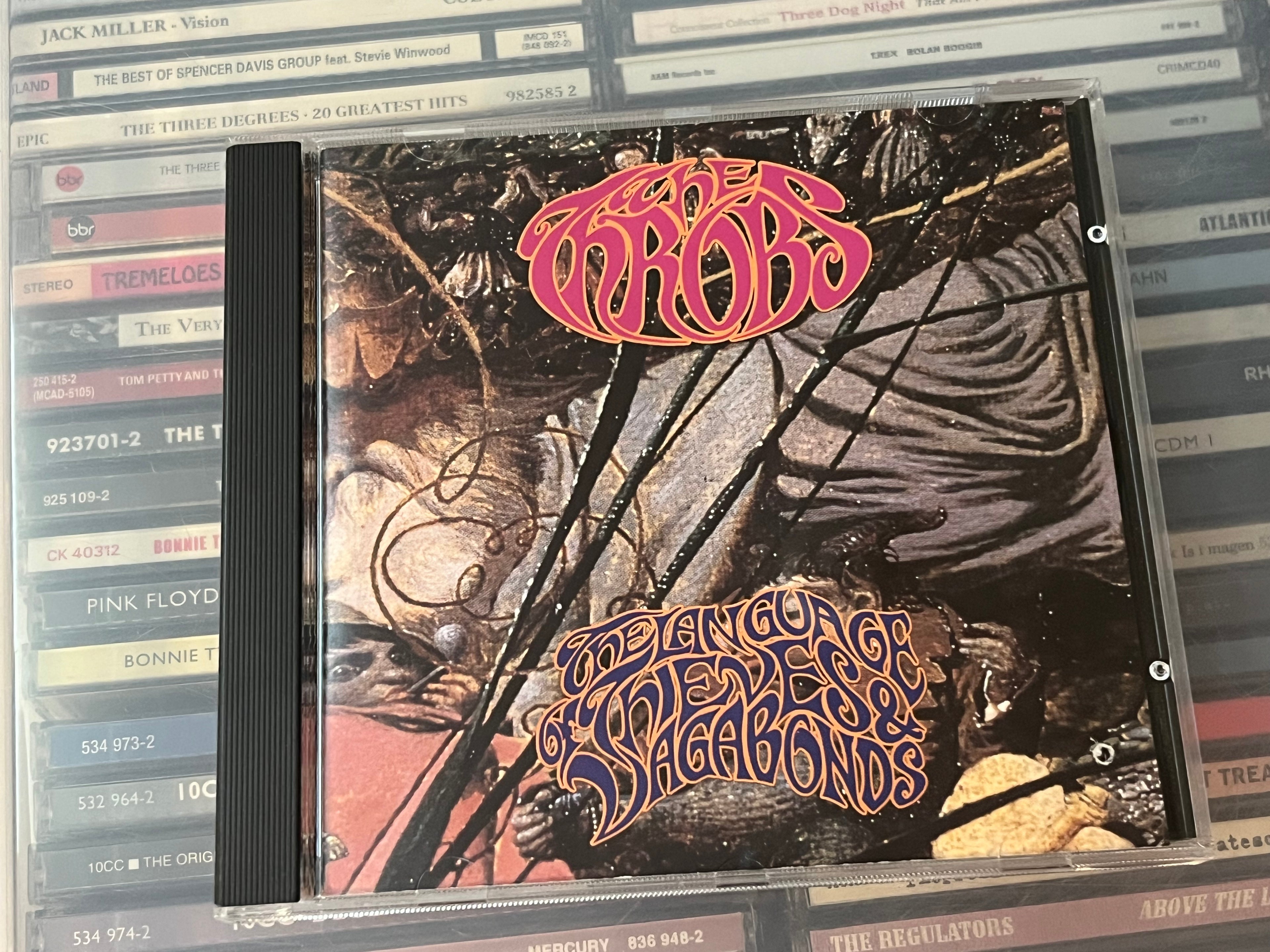 The Throbs ‎– The Language Of Thieves And Vagabonds (NM/vg+) tiny punchhole